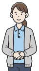 ポロシャツとカーディガンを着て、優しい表情で前を向いて立っている女性のイラスト